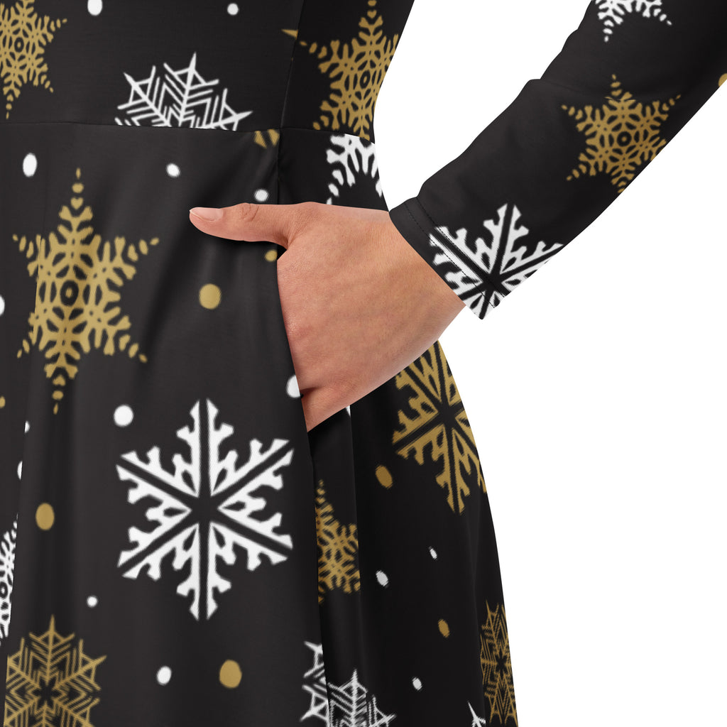 Black long sleeve midi dress with white and gold snowflake patterns and pockets for women’s winter wear