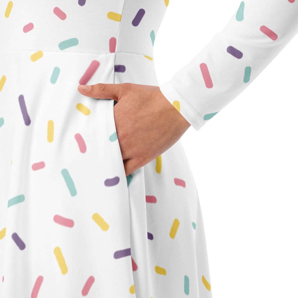 Women’s white long sleeve midi dress with colorful pastel sprinkle pattern and pockets for casual wear