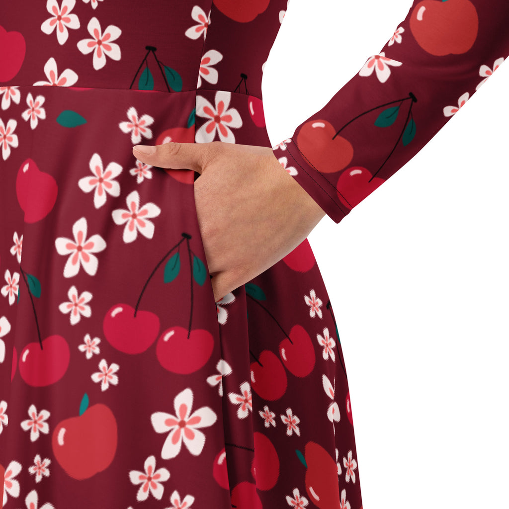 Women’s cherry blossom long sleeve midi dress in maroon with red cherries white flowers and green stems featuring pockets