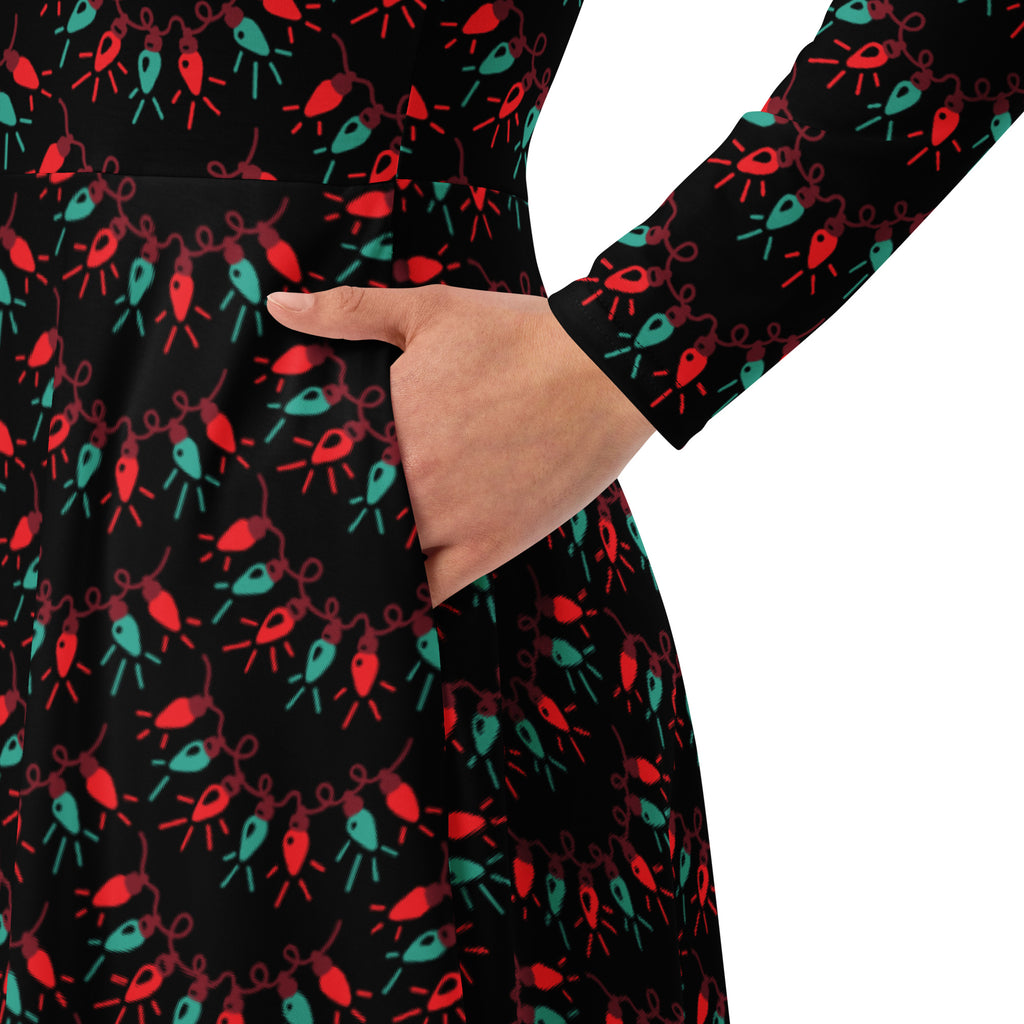 Black long sleeve midi dress with pockets featuring a festive red and teal christmas lights pattern