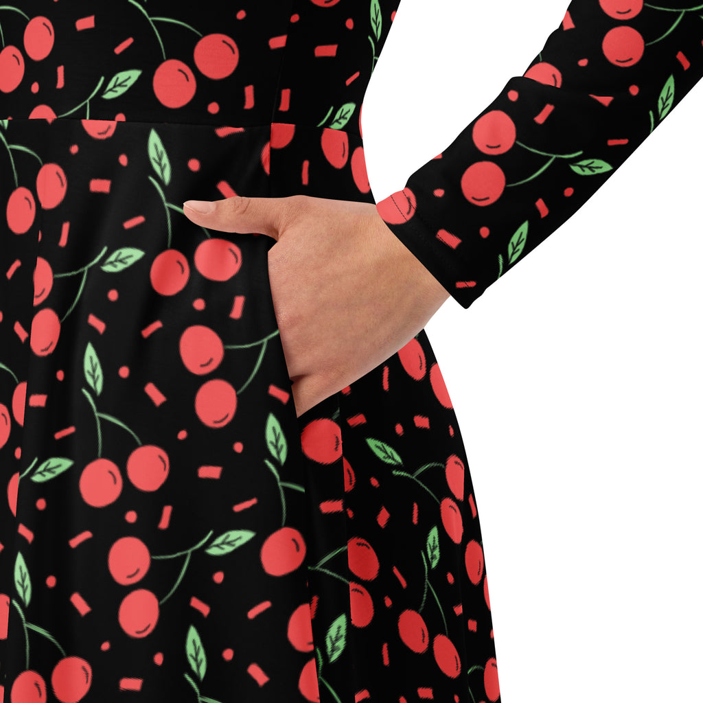 Women’s vintage black long sleeve midi dress with playful red and green cherry pattern and pockets