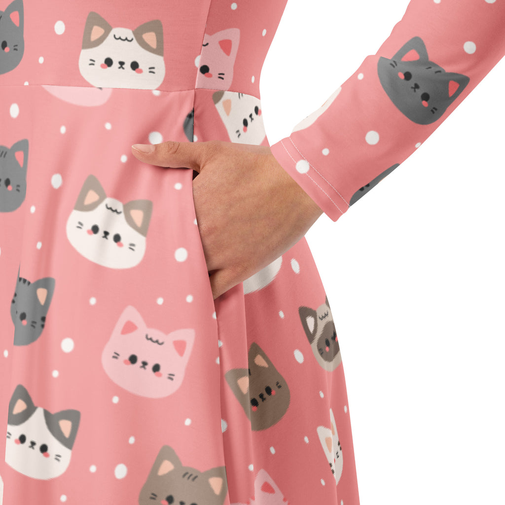 Women’s cute pink cat faces long sleeve midi dress with pockets featuring playful cartoon cat pattern on blush background