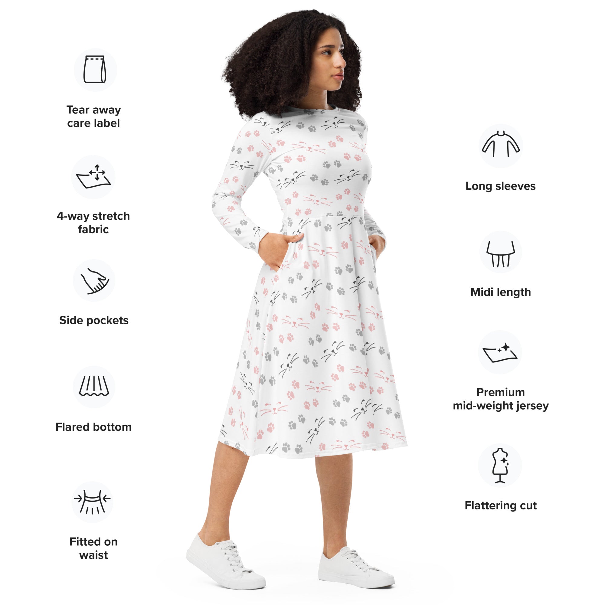 White long sleeve midi dress with pockets featuring pink and gray cat face print and flared bottom