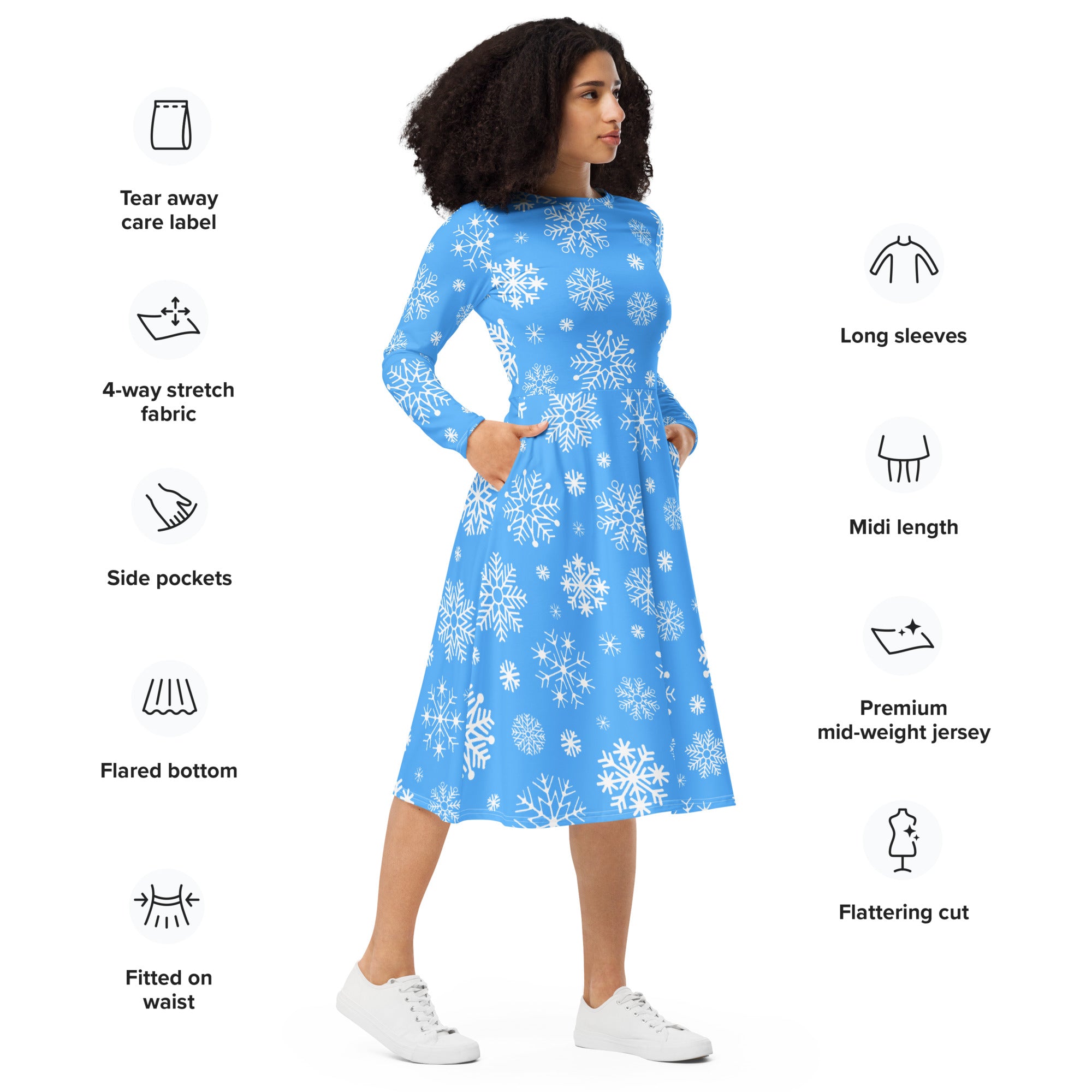 Women’s blue midi dress with white snowflake patterns long sleeves side pockets made from 4-way stretch fabric