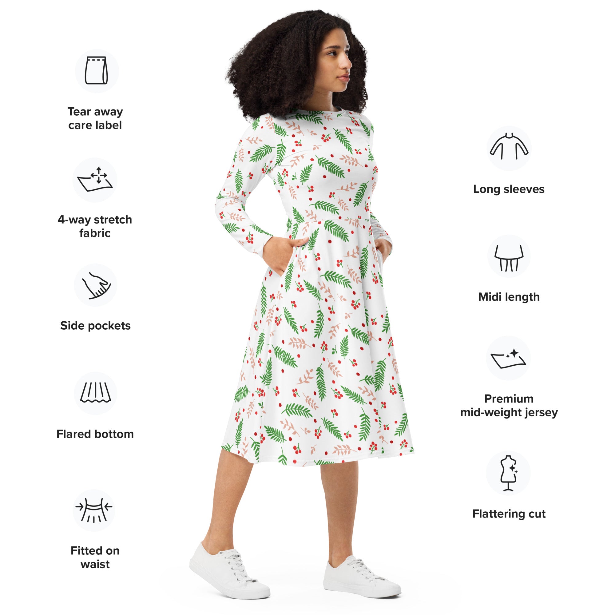 White midi dress with long sleeves and pockets featuring green fern and red berry pattern on premium jersey fabric
