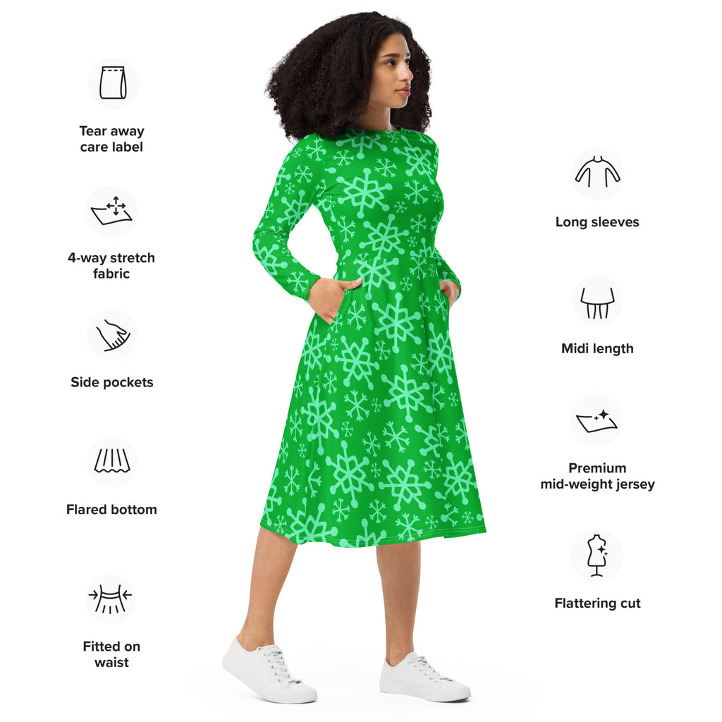 Women’s green snowflake long sleeve midi dress with pockets made from stretchy jersey fabric featuring a playful pattern