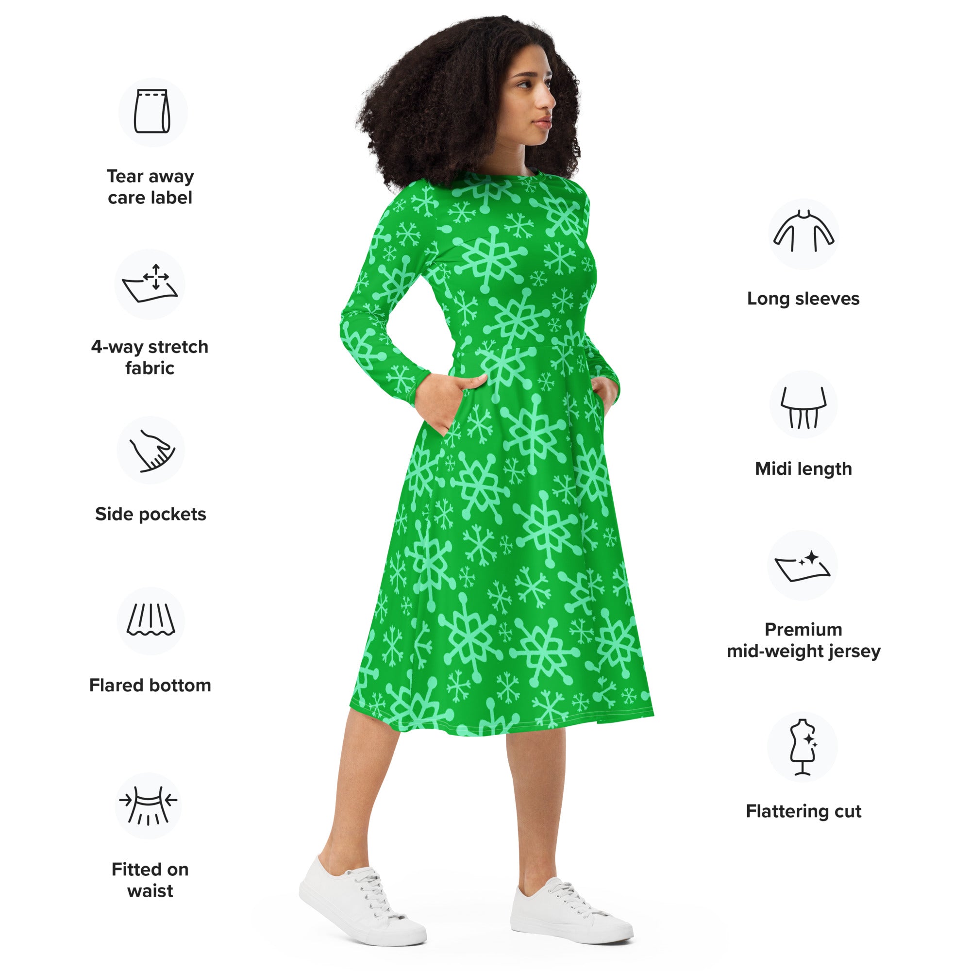 Women’s green snowflake long sleeve midi dress with pockets made from stretchy jersey fabric featuring a playful pattern