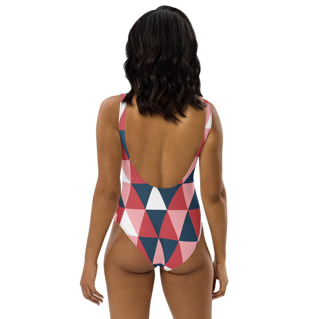 Women’s geometric colorblock one-piece swimsuit in pink navy blue and white with buttery soft fabric and UPF 50 plus protection