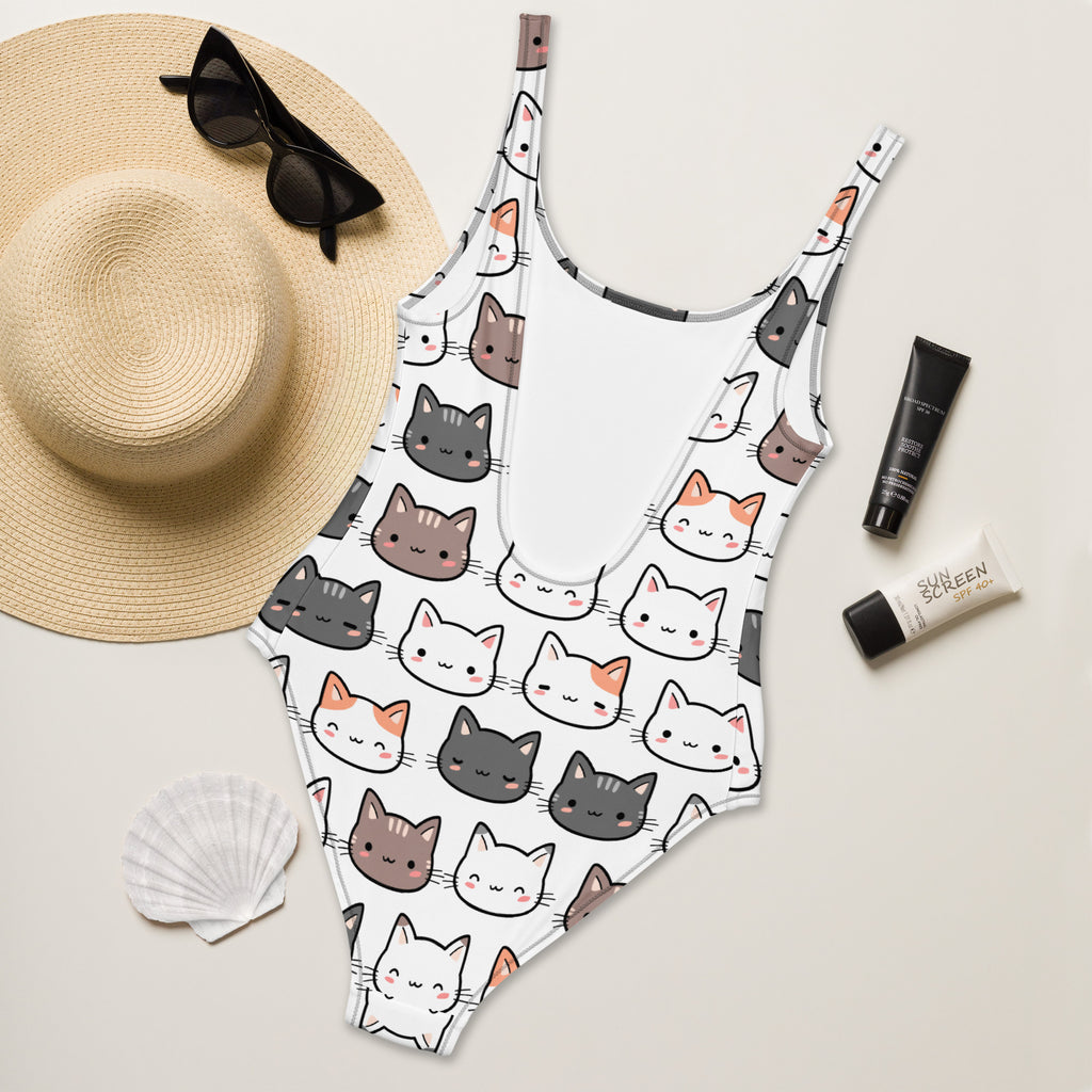 White one-piece buttery soft swimsuit with upf 50 plus featuring a colorful cartoon cat pattern for women