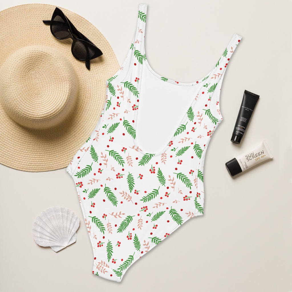 White one-piece swimsuit with green and red berry leaf pattern buttery soft fabric and UPF 50 plus for women