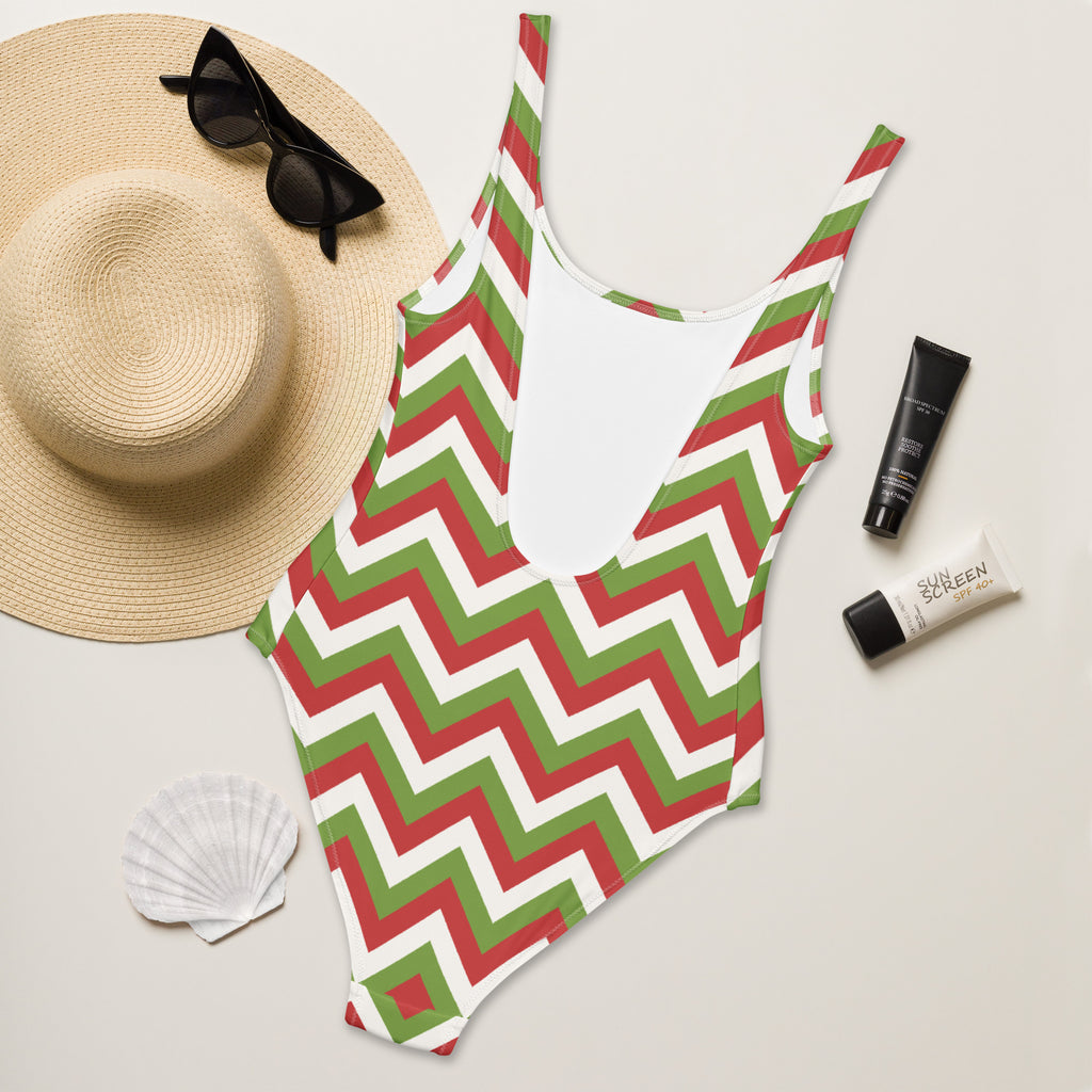 Women’s red and green chevron buttery soft one-piece swimsuit with UPF 50 plus and white interior
