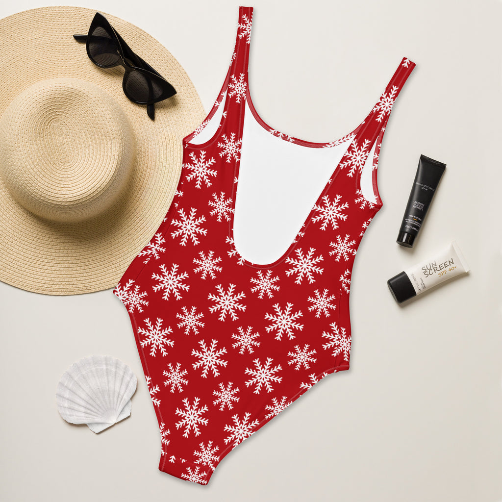 Women’s red one-piece swimsuit with white snowflake pattern white back panel buttery soft fabric upf 50+