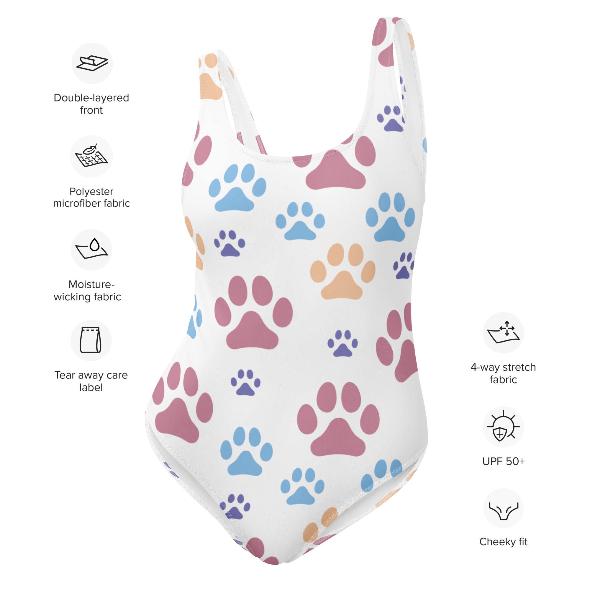 White one-piece swimsuit with colorful paw print pattern in pink blue and beige buttery soft fabric with UPF 50+