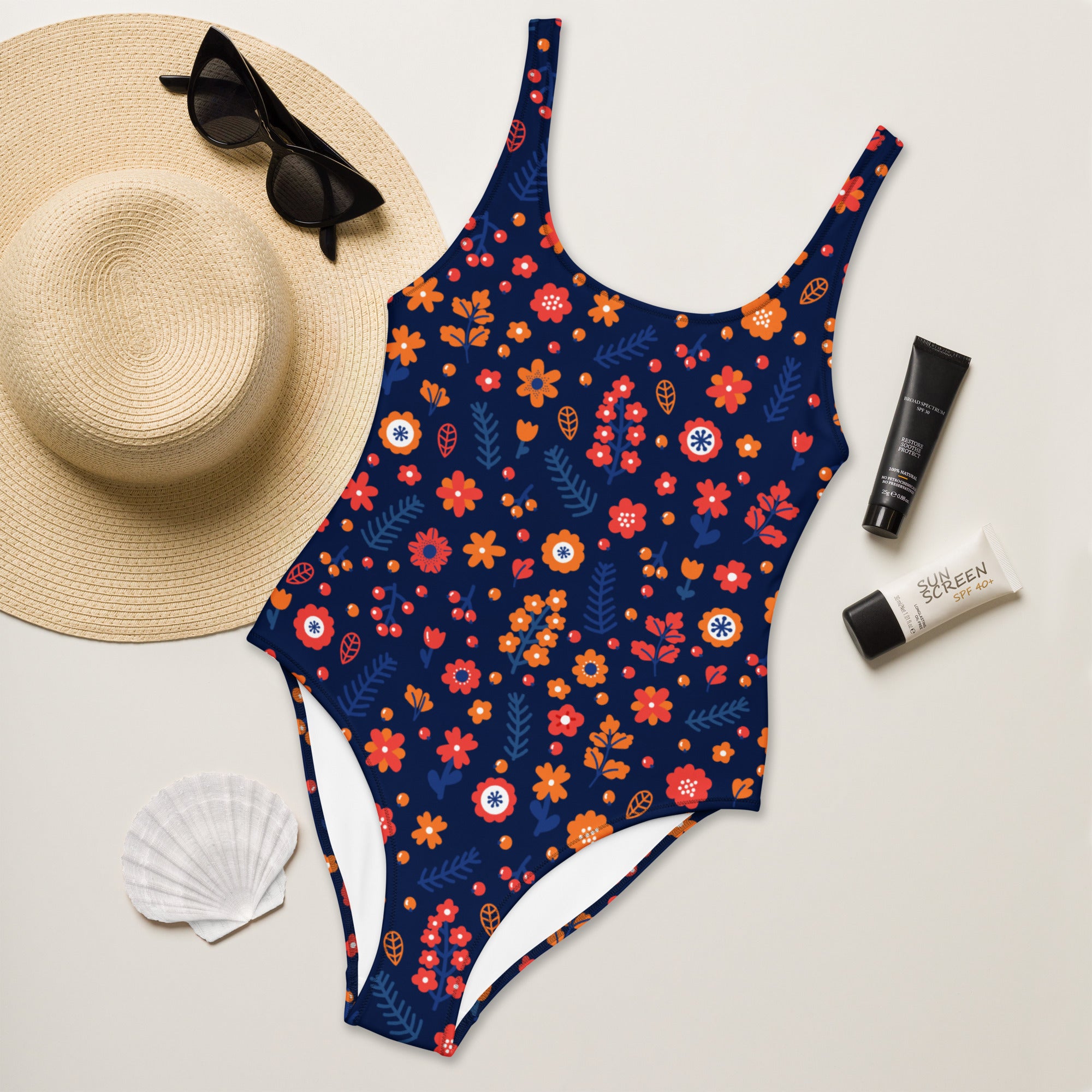 Navy blue women’s one-piece dark floral swimsuit with buttery soft fabric and UPF 50 plus sun protection