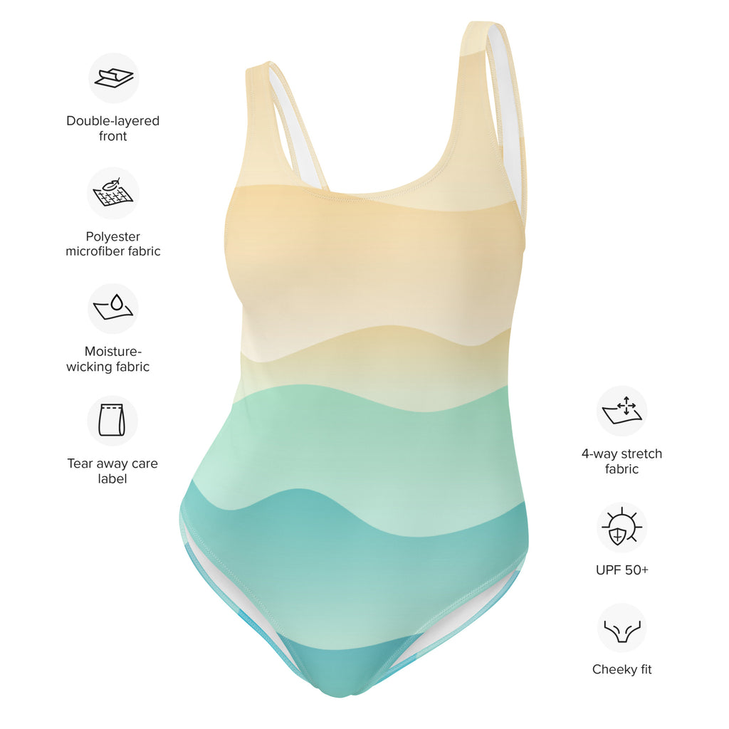Women’s sandy ocean wave gradient one-piece swimsuit in pale yellow to teal with white straps made of polyester microfiber