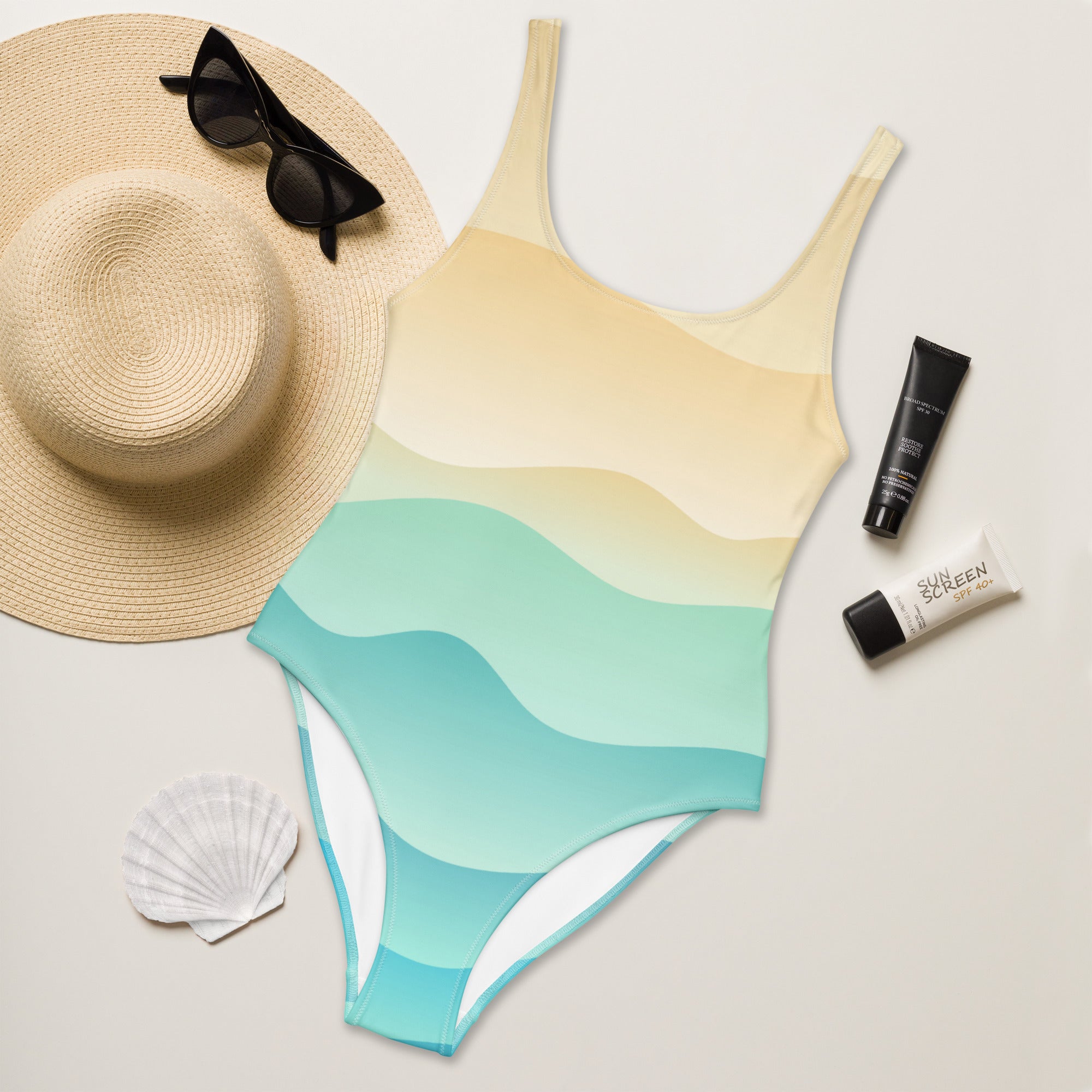 Women’s sandy ocean wave gradient buttery soft one-piece swimsuit with UPF 50+ in yellow to turquoise with white trim