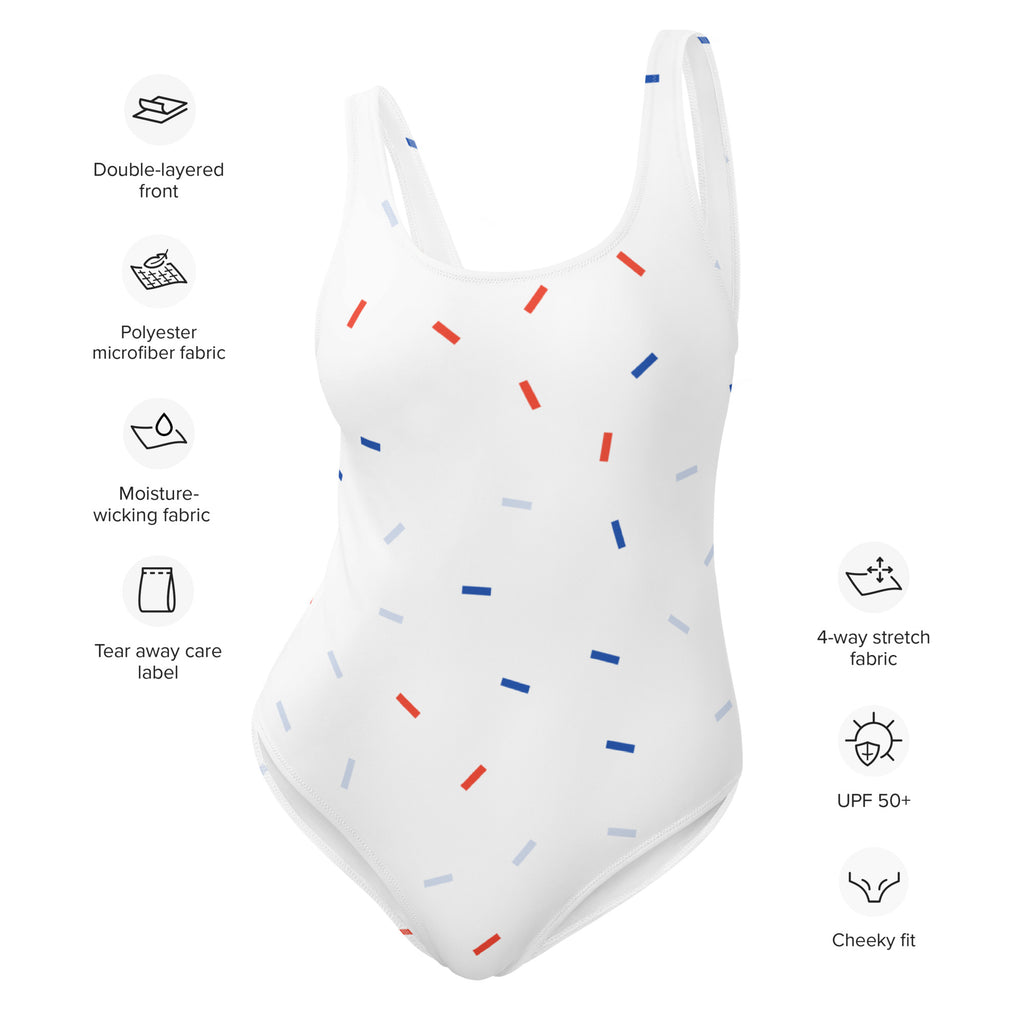 White one-piece women’s patriotic confetti swimsuit with playful red blue and gray lines and buttery soft fabric with UPF 50+