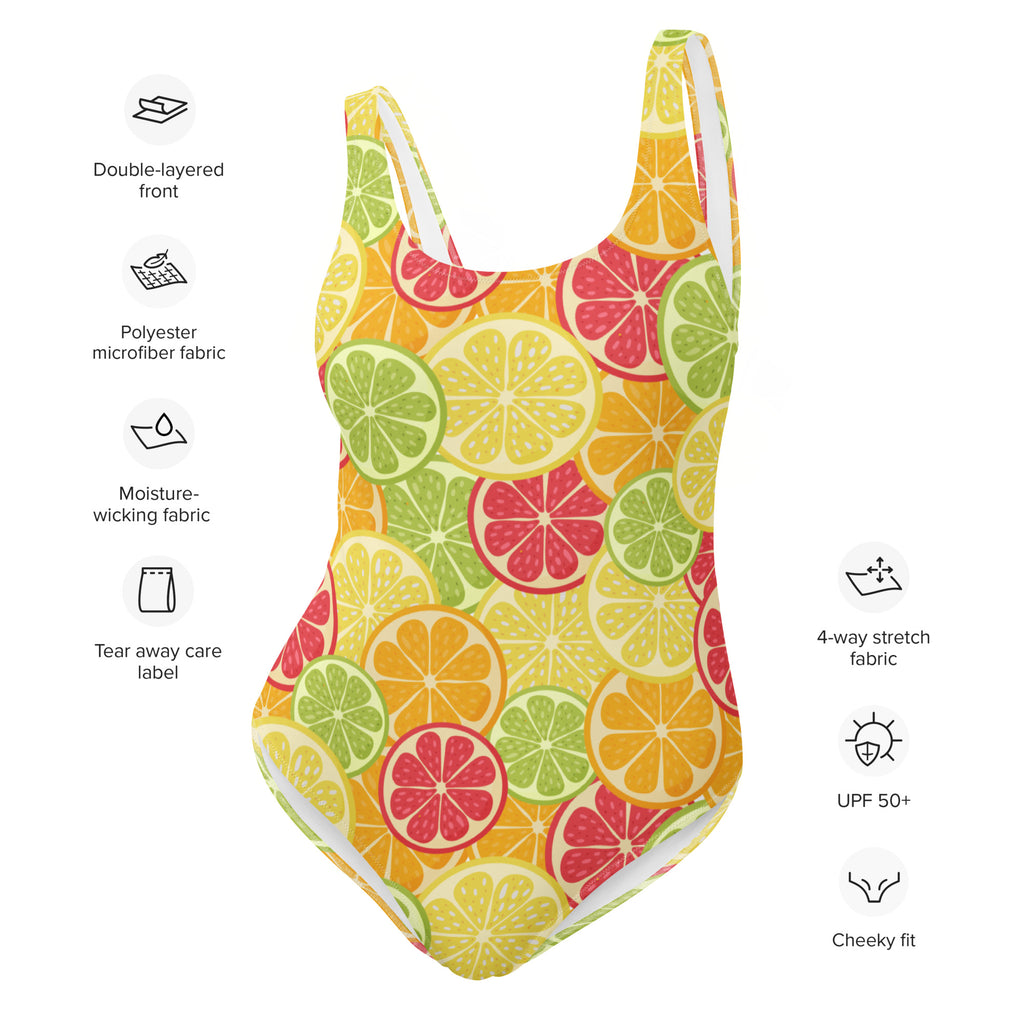 A vibrant yellow women’s one-piece citrus fruit slices swimsuit with buttery soft fabric and upf 50 plus protection