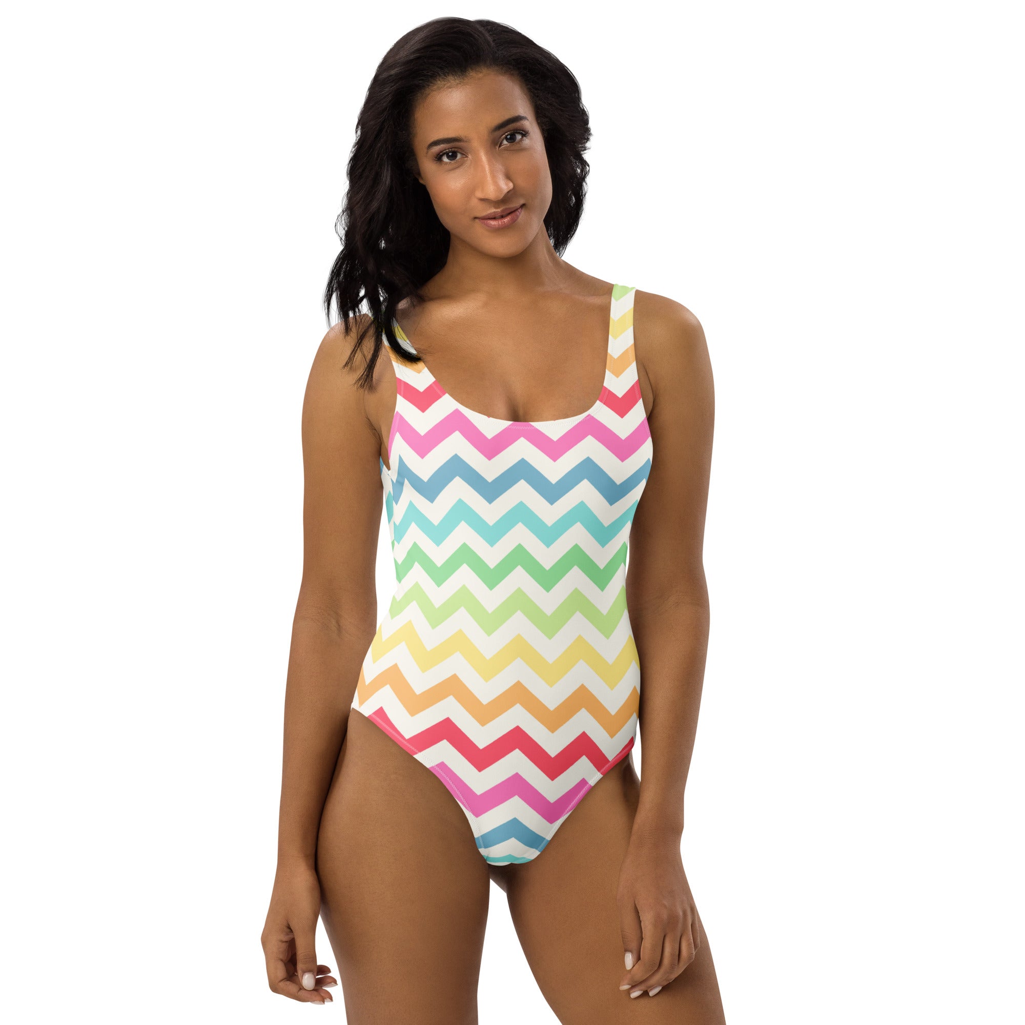 A vibrant pastel rainbow chevron one-piece swimsuit with thin straps buttery soft fabric and upf 50+ protection