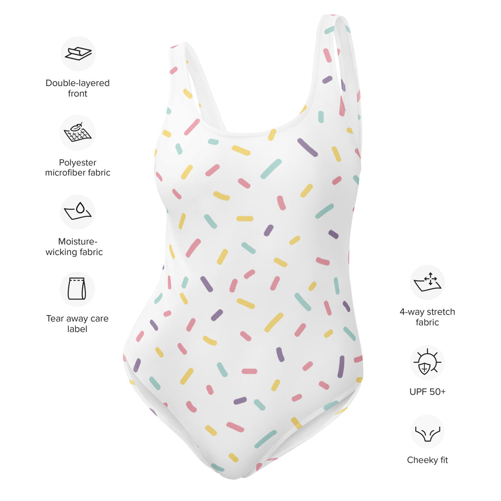 White one-piece swimsuit with pastel sprinkle pattern in pink yellow green purple buttery soft fabric with UPF 50+