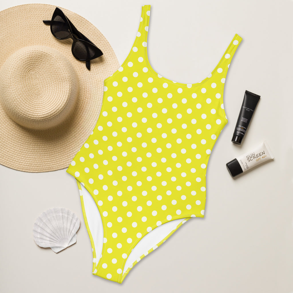 Bright yellow women’s one-piece swimsuit with white polka dots buttery soft fabric and UPF 50 plus protection
