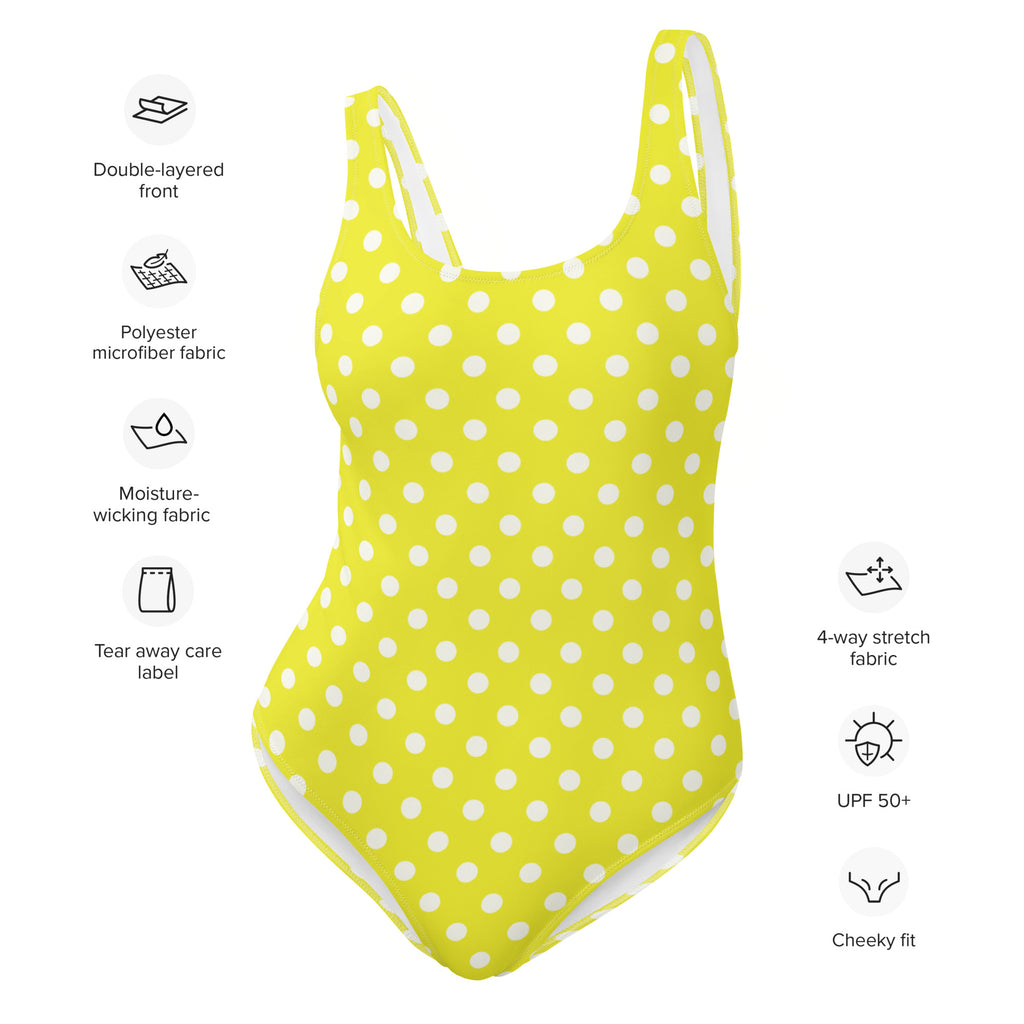 Women’s yellow polka dot buttery soft swimsuit with upf 50 plus featuring a cheeky fit and one-piece design