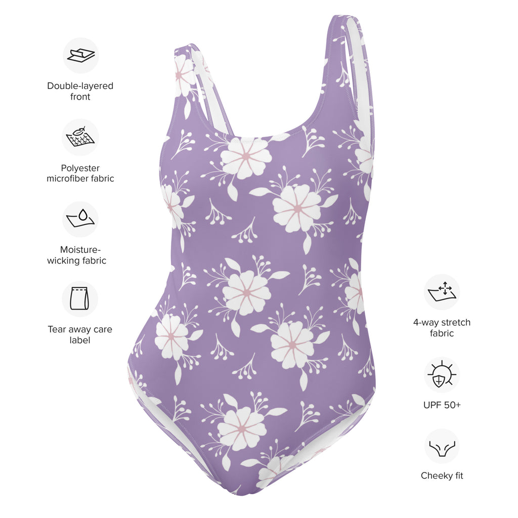 Lavender one-piece buttery soft swimsuit with white floral pattern thin straps and UPF 50 plus sun protection