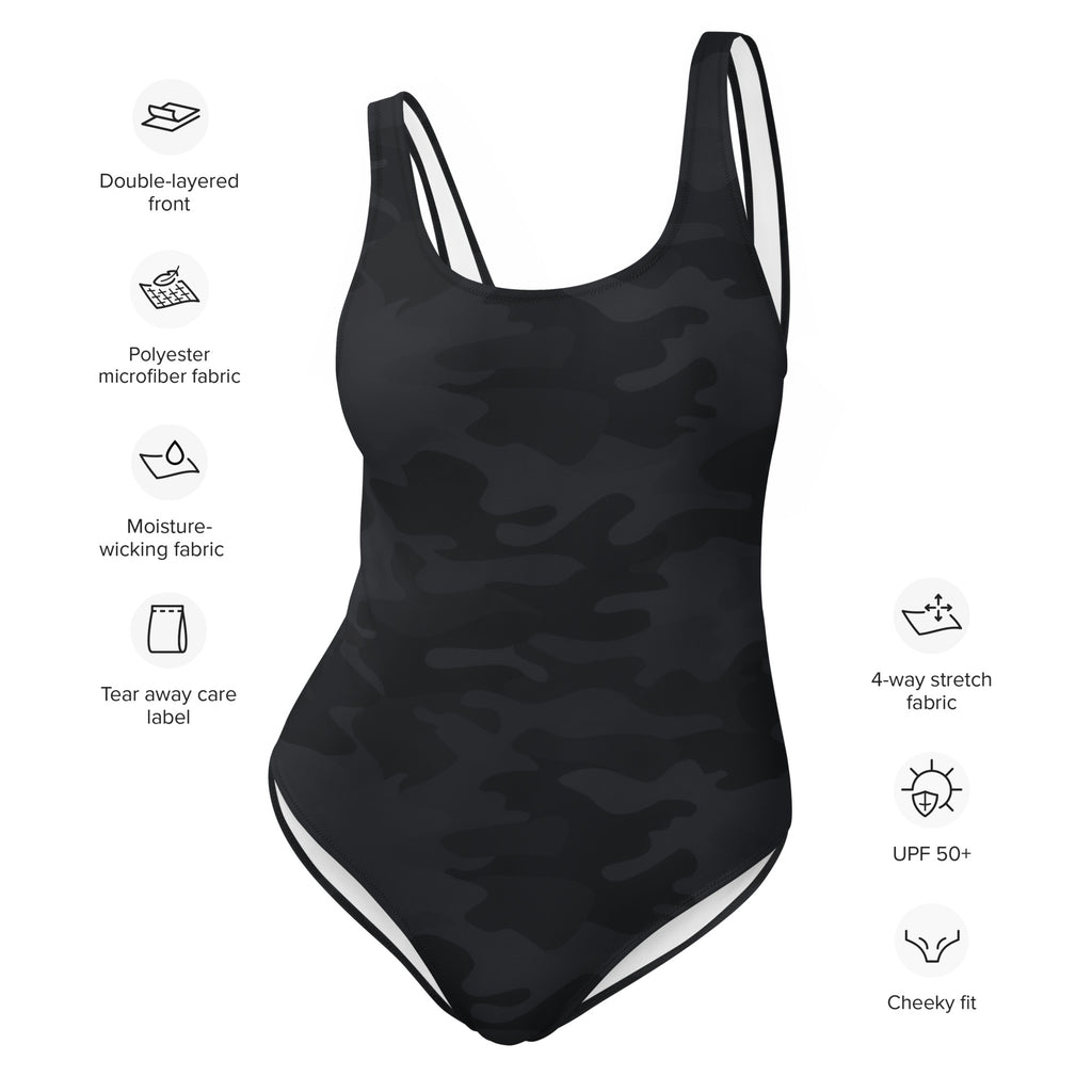 Women’s black camo one-piece swimsuit with white trim, buttery soft fabric, and UPF 50 plus sun protection
