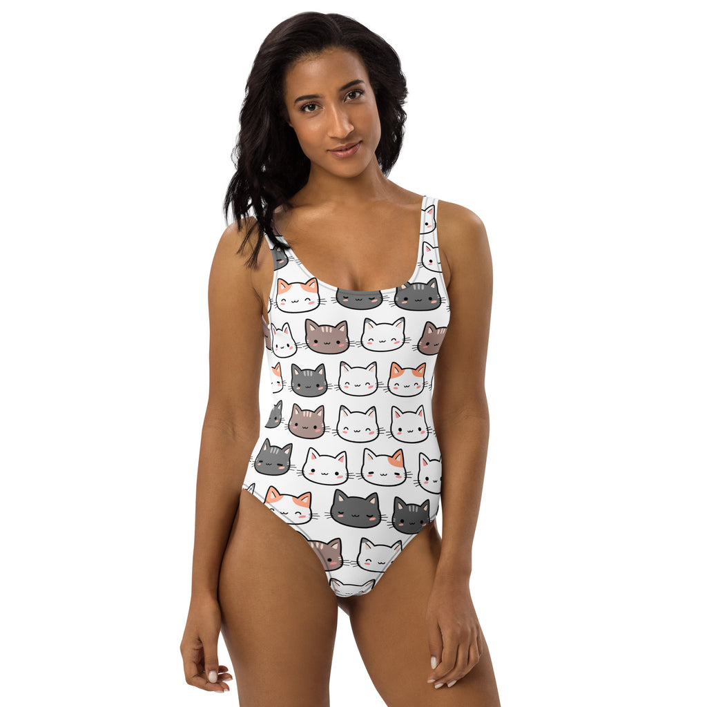White one-piece cat buttery soft swimsuit with colorful cartoon cat faces and UPF 50 plus for women