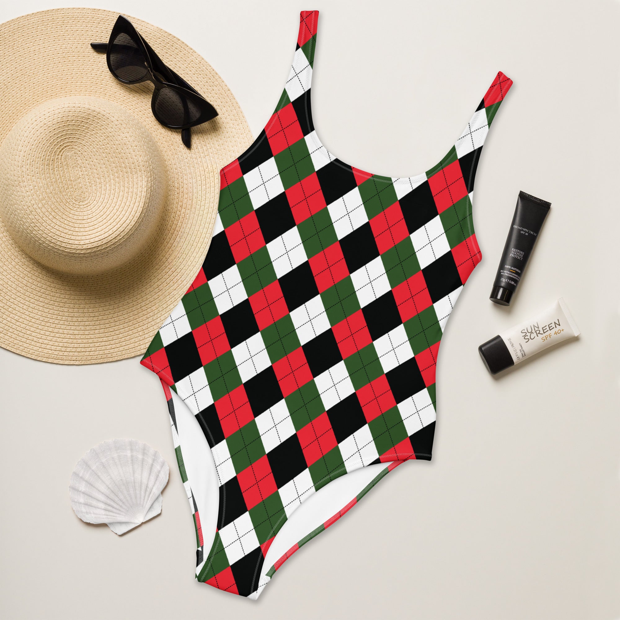 Women’s Christmas argyle one-piece swimsuit with bold red green black and white pattern and buttery soft fabric with UPF 50+