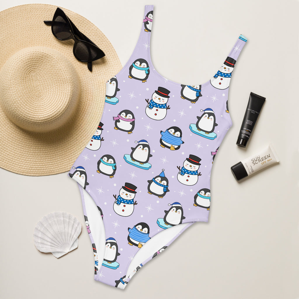 Lavender women’s one-piece swimsuit with cute penguin and snowman pattern buttery soft fabric upf 50+