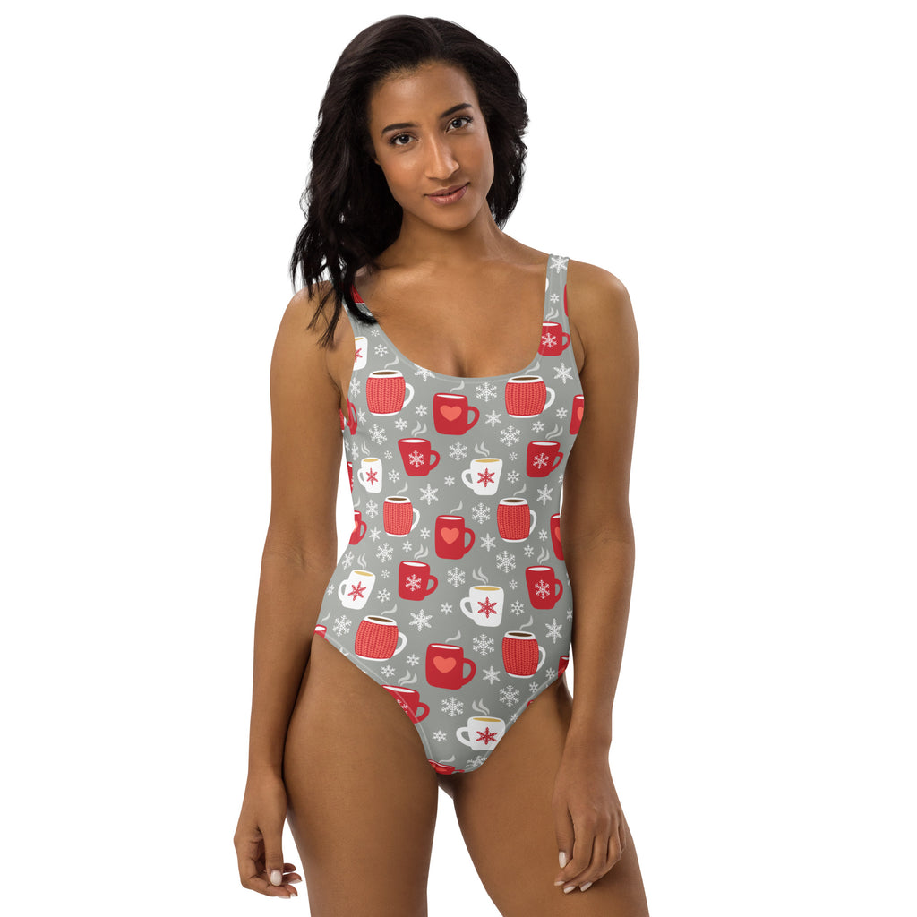 Women’s gray one-piece buttery soft swimsuit with upf 50 plus featuring red and white coffee mugs hearts and snowflakes pattern