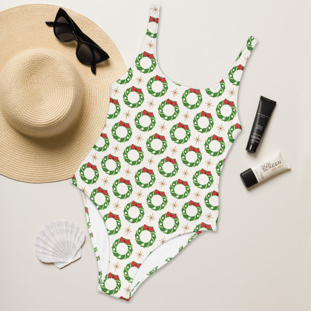 White one-piece womens swimsuit with christmas wreath pattern buttery soft fabric and UPF 50 plus sun protection