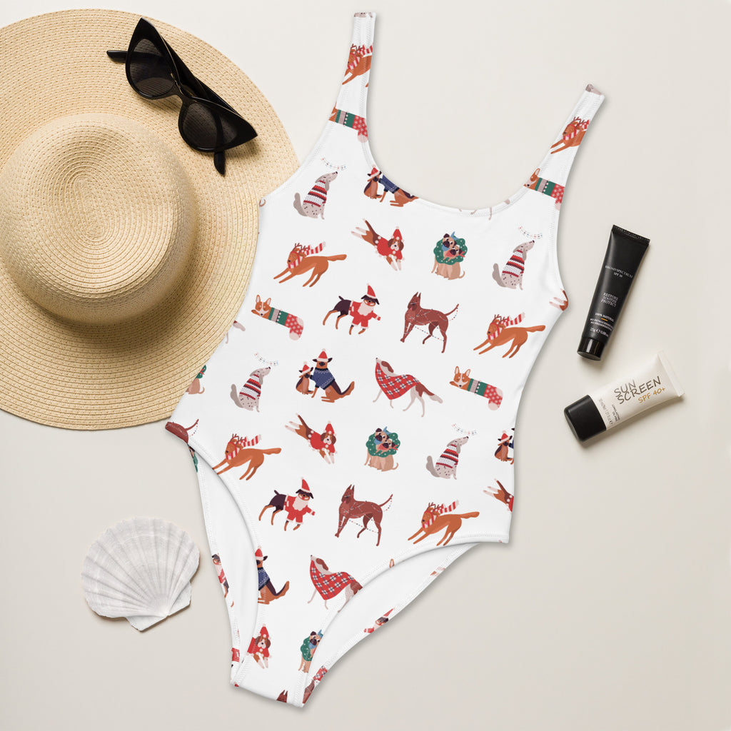 White one-piece buttery soft swimsuit with upf 50 plus featuring festive holiday dogs pattern for women