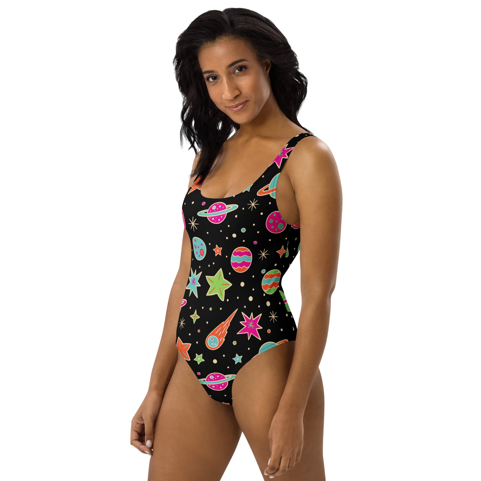 Black one-piece swimsuit with vibrant neon space pattern of colorful planets stars and comets buttery soft with UPF 50+