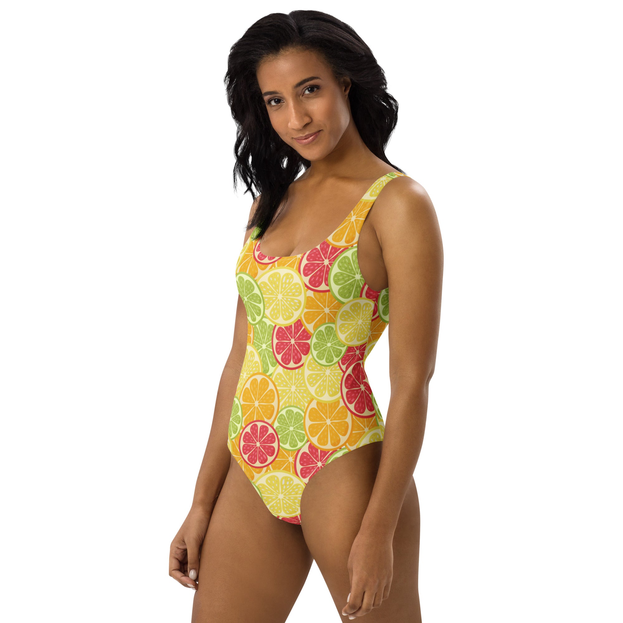 A vibrant yellow women’s one-piece buttery soft swimsuit featuring citrus fruit slices pattern with UPF 50 plus protection