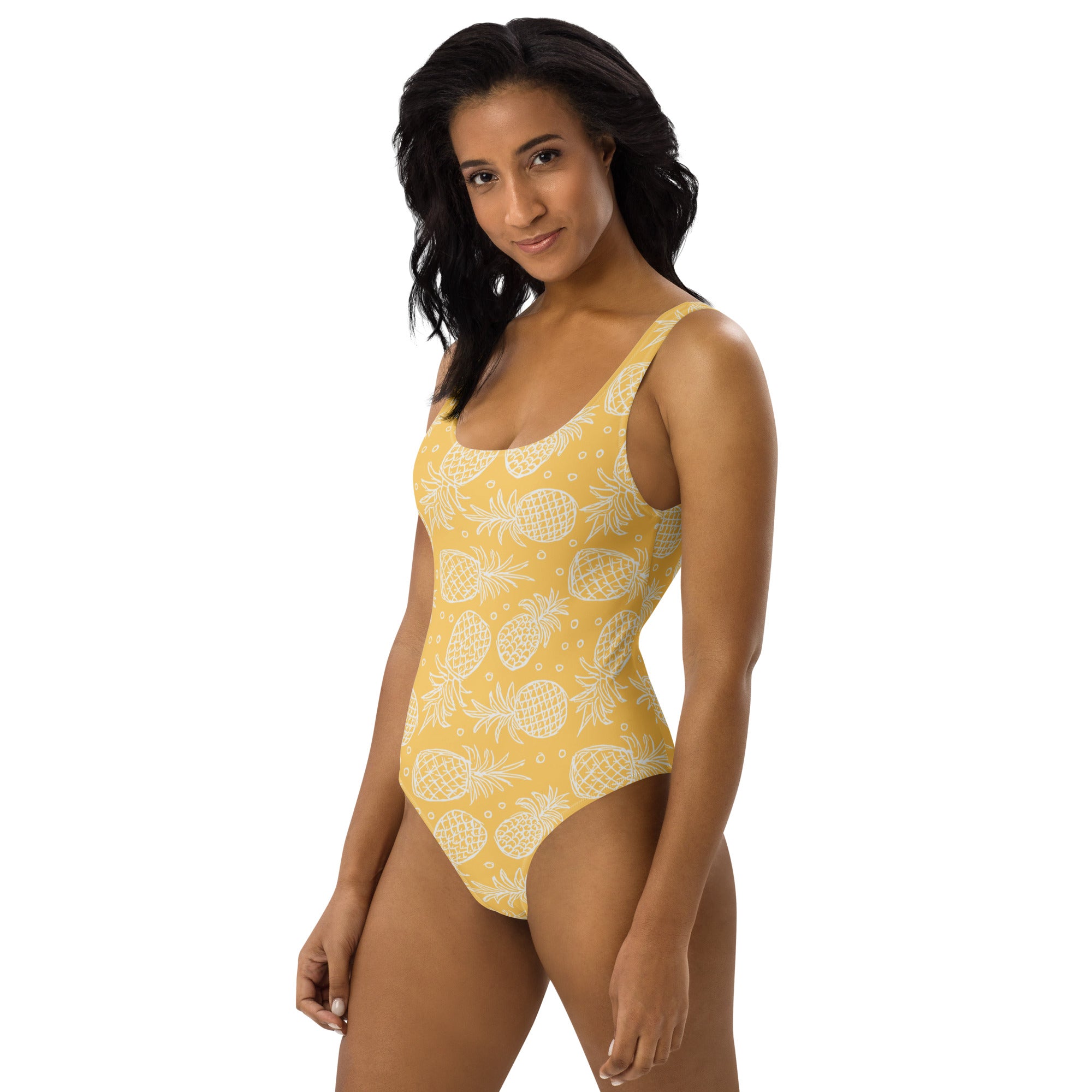 Women’s yellow one-piece swimsuit with white pineapple pattern buttery soft fabric and UPF 50+ sun protection