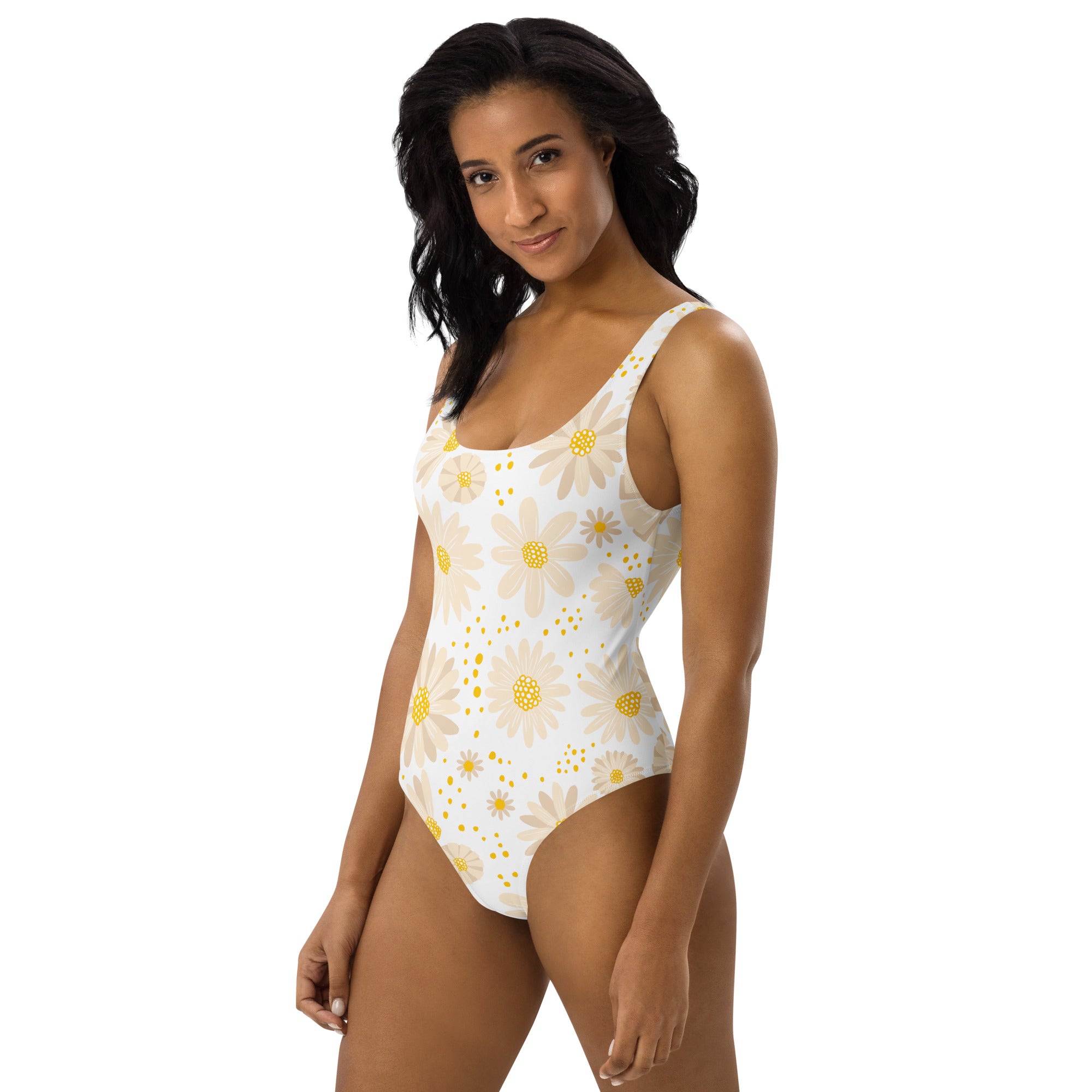A white one-piece swimsuit with cream and yellow daisy pattern buttery soft with upf 50 plus protection