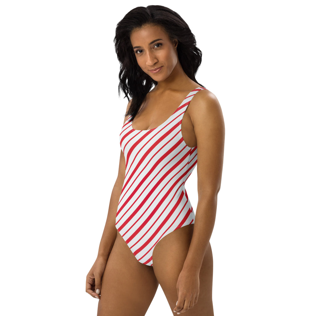 Women’s candy cane stripe christmas buttery soft swimsuit with upf 50 plus in red and white diagonal stripes with scoop neckline