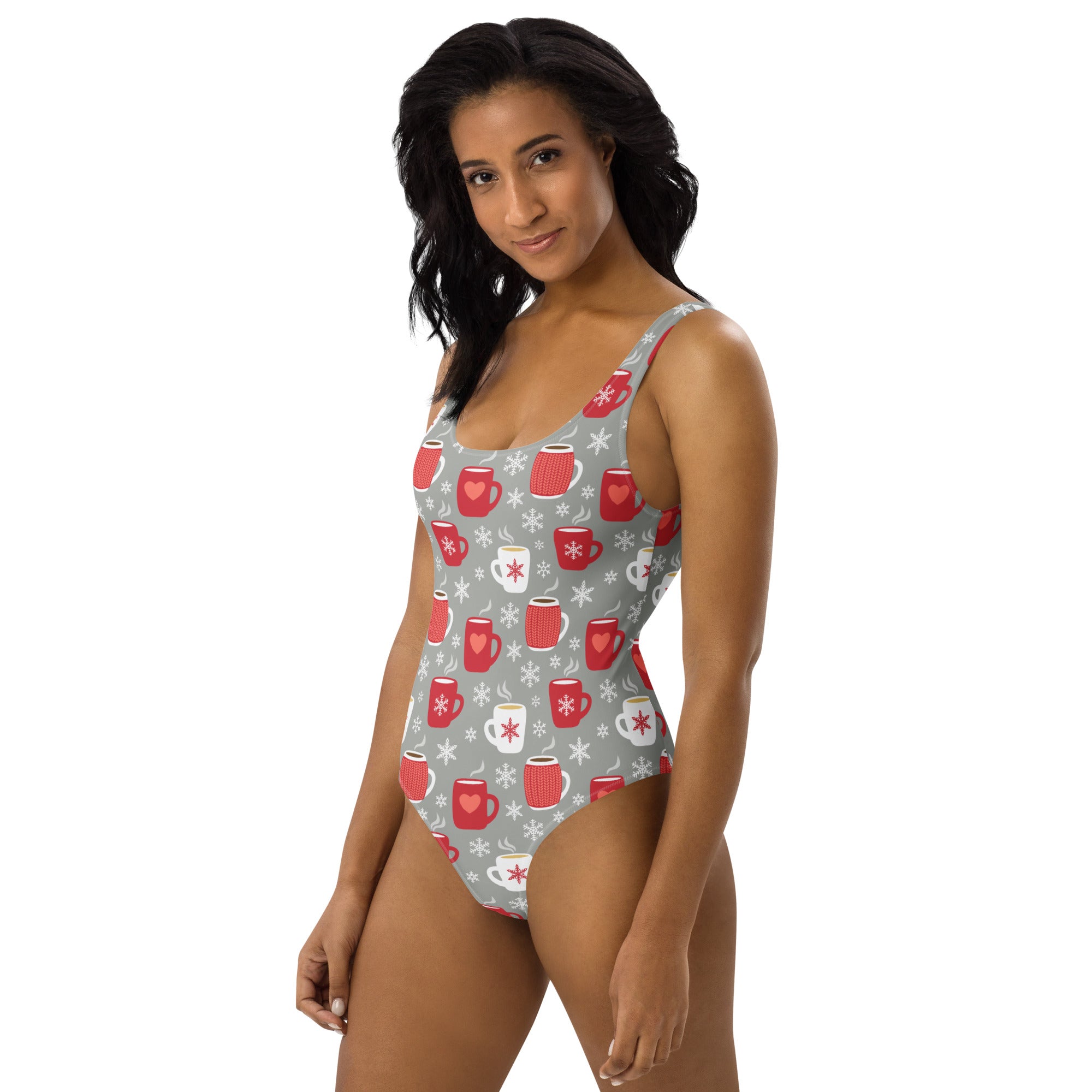 A gray buttery soft women’s one-piece swimsuit with red and white mug pattern and UPF 50 plus sun protection