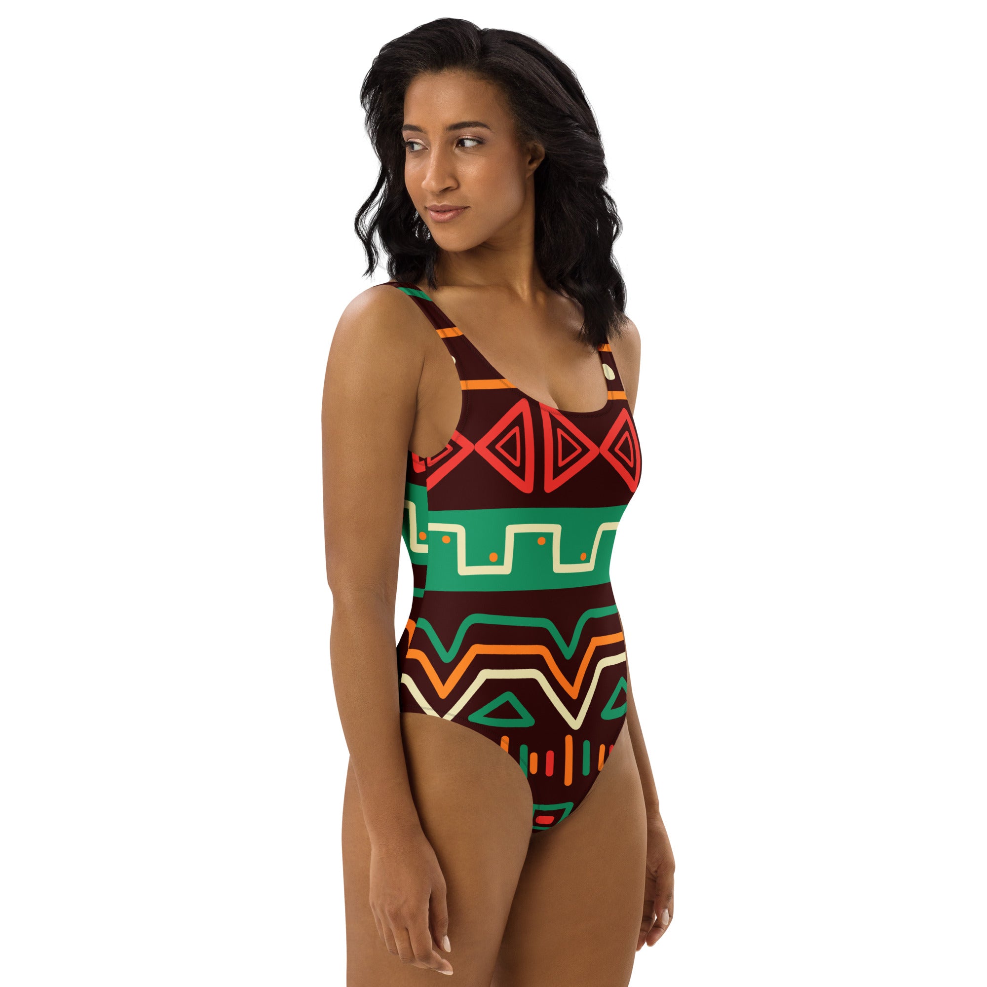 Women’s african-inspired tribal print one-piece swimsuit in buttery soft fabric with bold geometric red green orange and cream