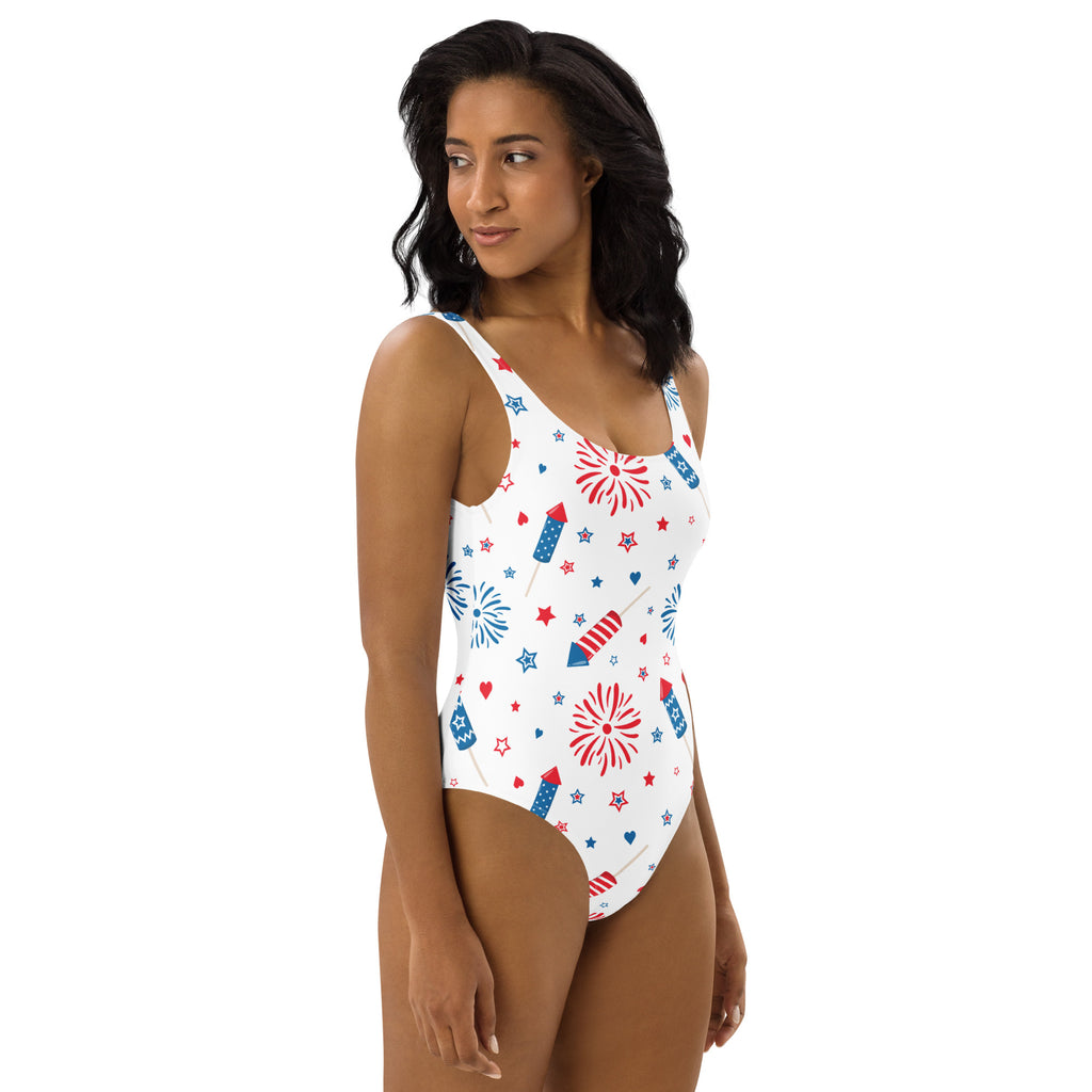 White one-piece swimsuit with red and blue fireworks pattern buttery soft fabric UPF 50+ for 4th of July women