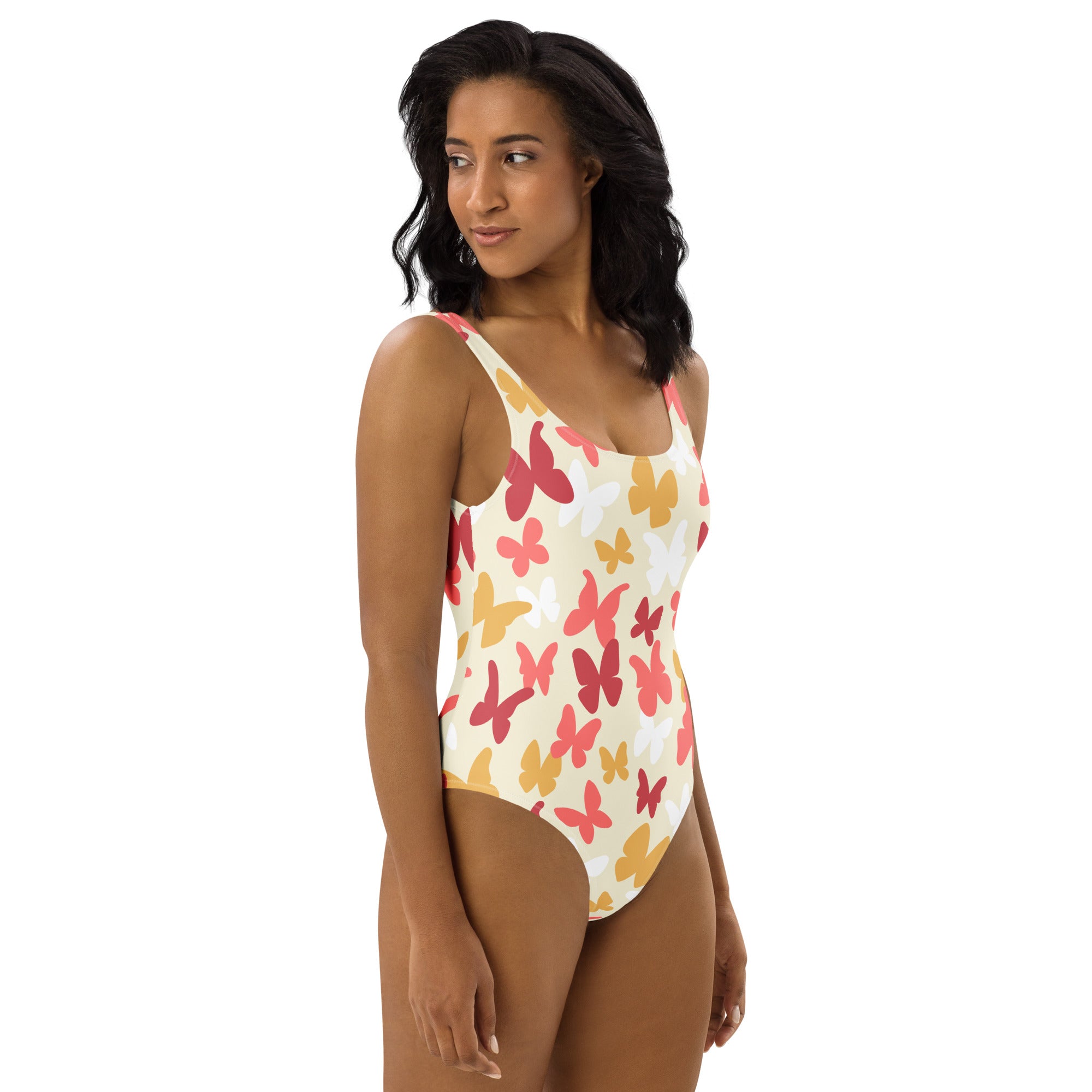 Women’s warm-tone one-piece swimsuit with pink and yellow butterflies on creamy white buttery soft fabric upf 50+