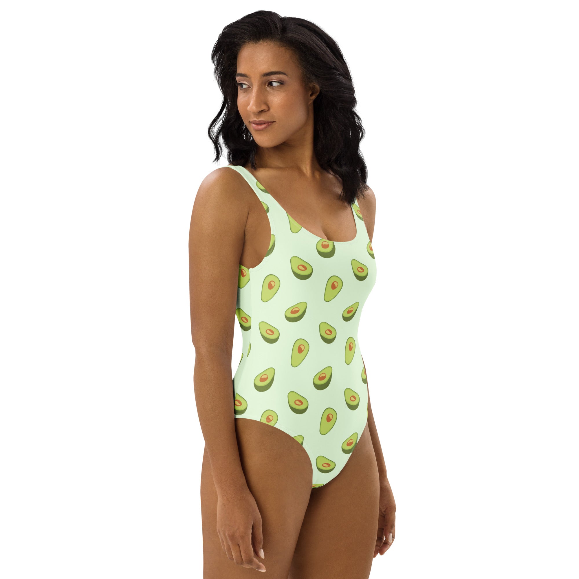 A light green women’s one-piece swimsuit with avocado print buttery soft fabric and UPF 50 plus sun protection
