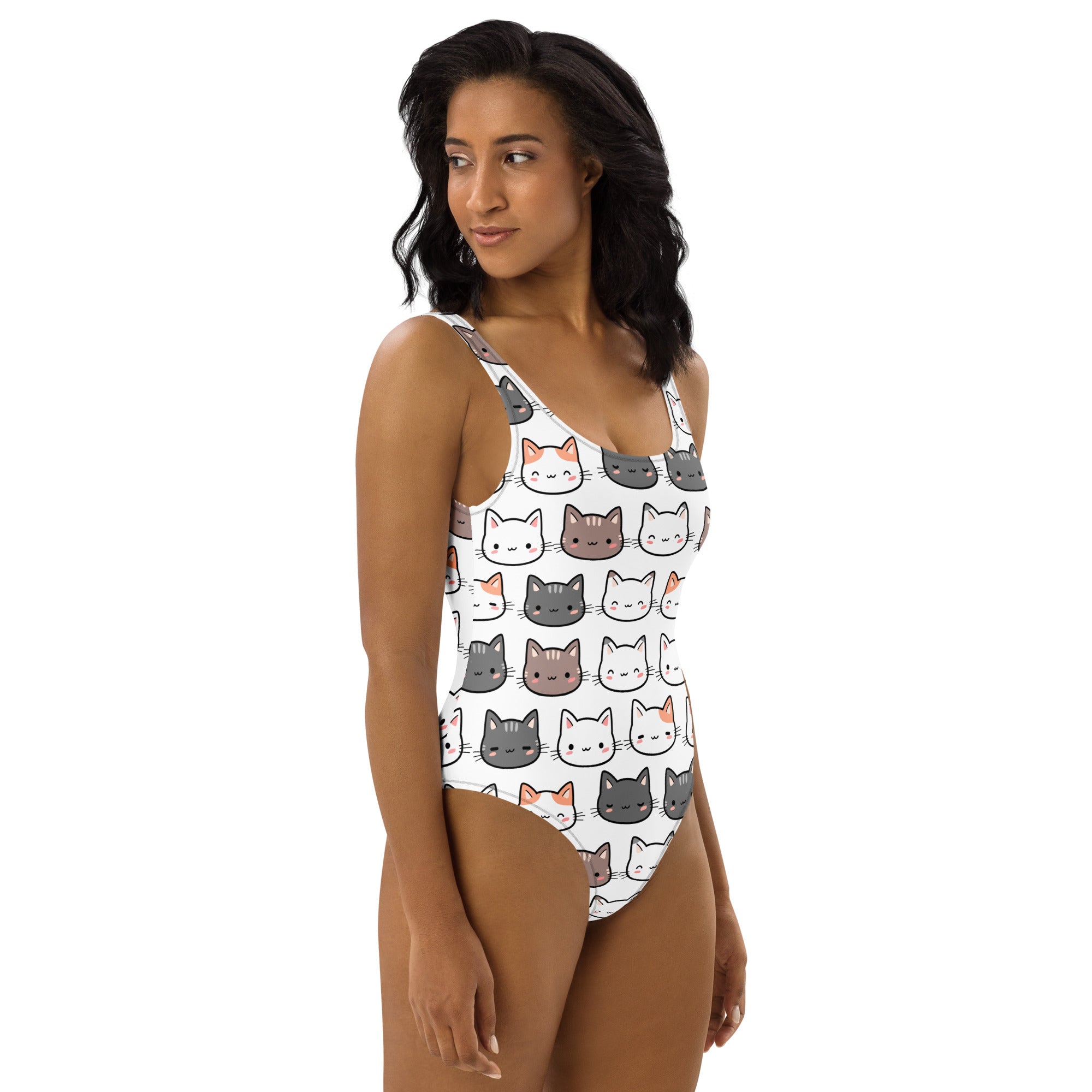 White one-piece swimsuit with playful cartoon cats in gray white and orange made of buttery soft fabric with upf 50+ protection