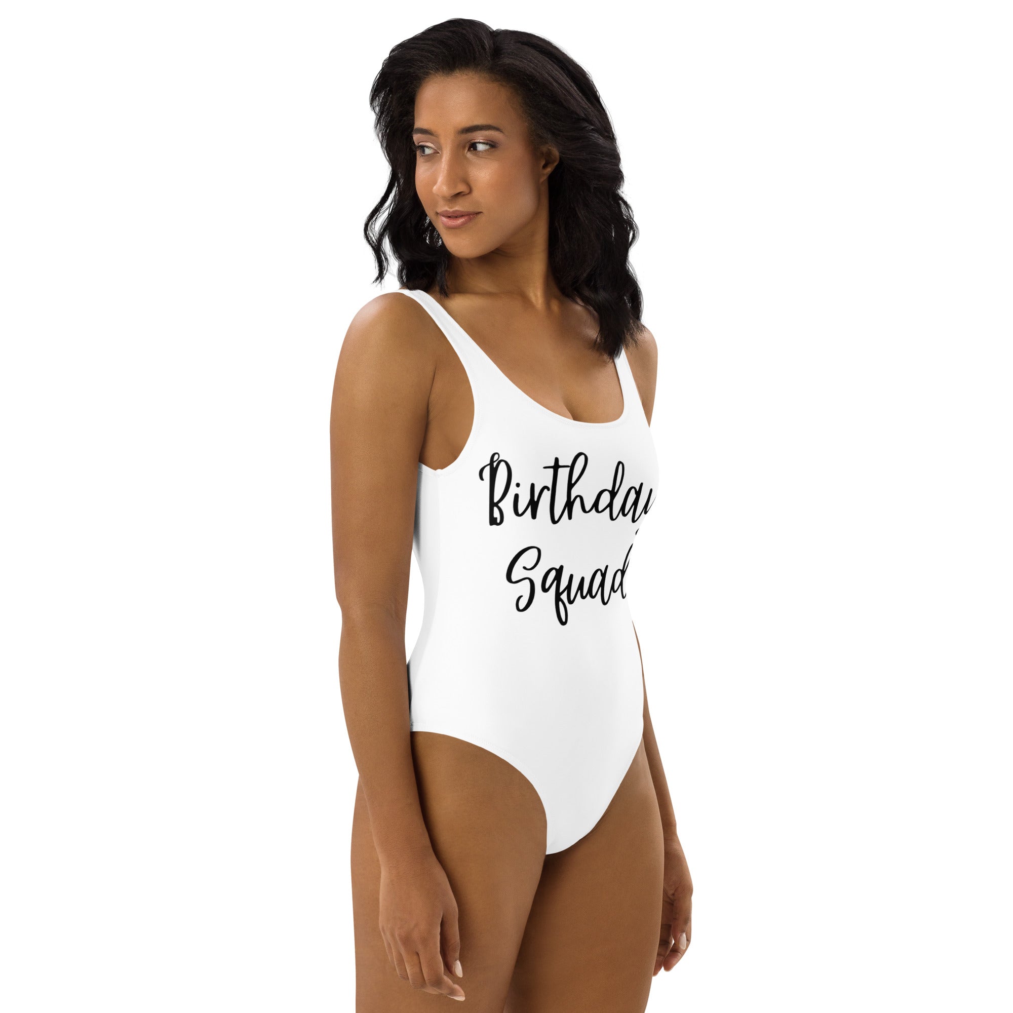White buttery soft one-piece swimsuit with birthday squad printed in black cursive and UPF 50 plus protection