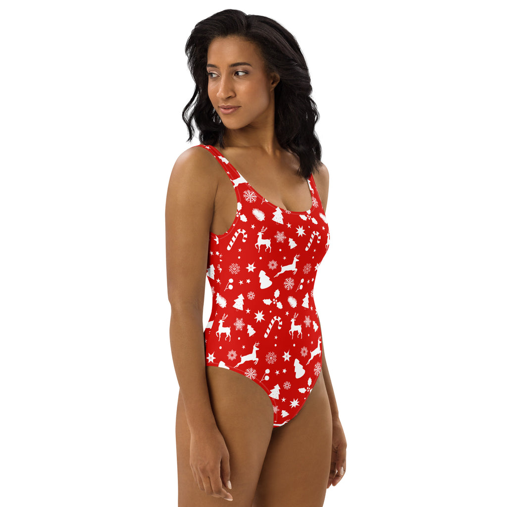 Women’s red christmas buttery soft one-piece swimsuit with white reindeer snowflakes candy canes and upf 50 plus