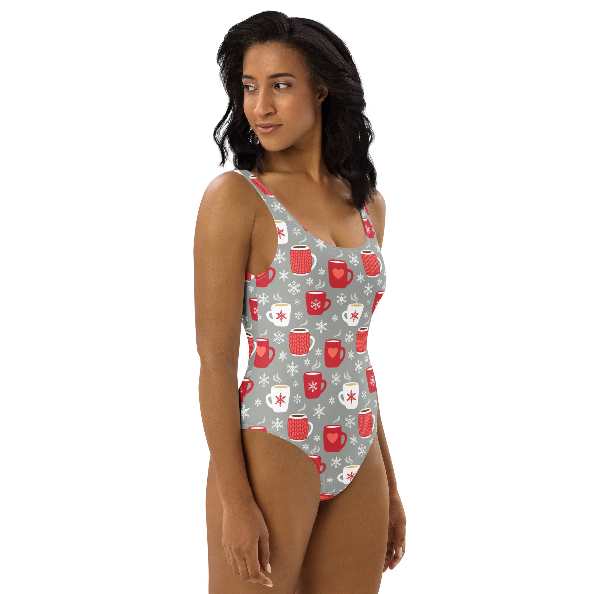 A gray buttery soft one-piece swimsuit with red and white mugs pattern and UPF 50 plus for hot cocoa Christmas fun