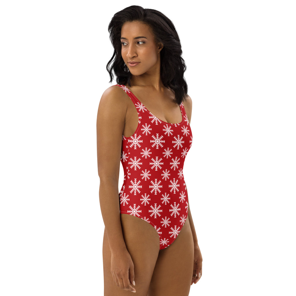 Women’s red one-piece swimsuit with white snowflake pattern buttery soft fabric and upf 50+ for christmas wear