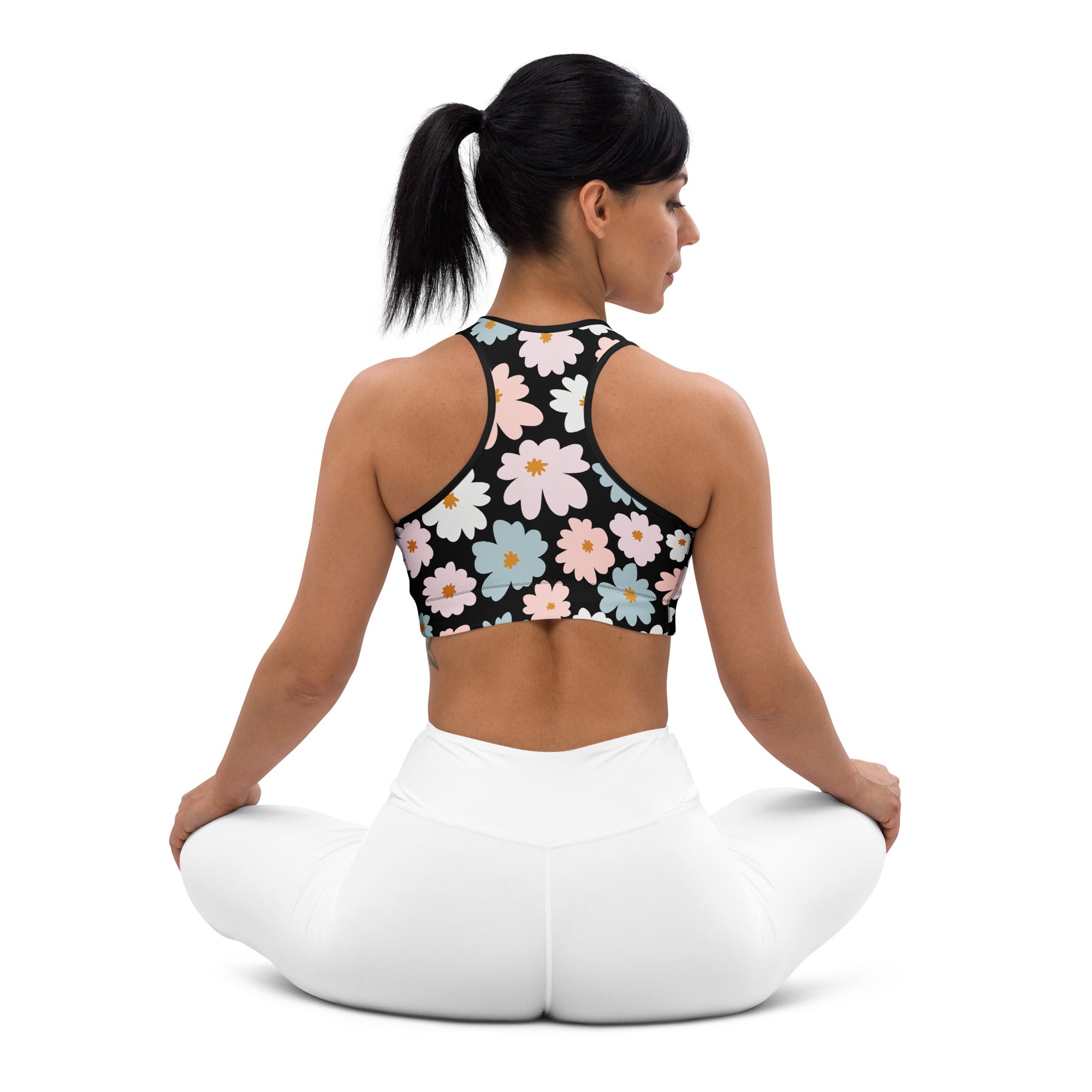 Women’s retro floral padded sports bra in black with pink white and light blue daisies buttery soft supportive and quick dry